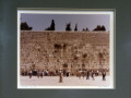 A close-up view of the top photograph to the right of the “Shalom” wall hanging.