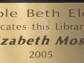 A close-up view of the plaque on the library door.