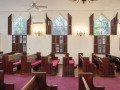 A view of the middle of the right wall of the sanctuary, looking from left to right across the sanctuary.