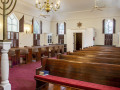 A view of the right side of the sanctuary, looking from the front of the sanctuary toward the back of the sanctuary.