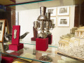 A close-up view of some of the objects in the glass cabinet in the short hall between the kitchen and the sanctuary.
