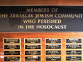 A close-up view of the first 4 rows of names on the plaque dedicated to the members of the Zbraslav Jewish community who perished in the Holocaust.