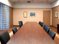 A view of the conference room, looking from the right side of the room toward the left side of the room.
