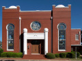 A view of the front of Temple Sinai, looking from across Church Street toward the synagogue.