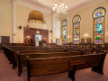 A view of the sanctuary, looking from left to right across the back of the sanctuary.